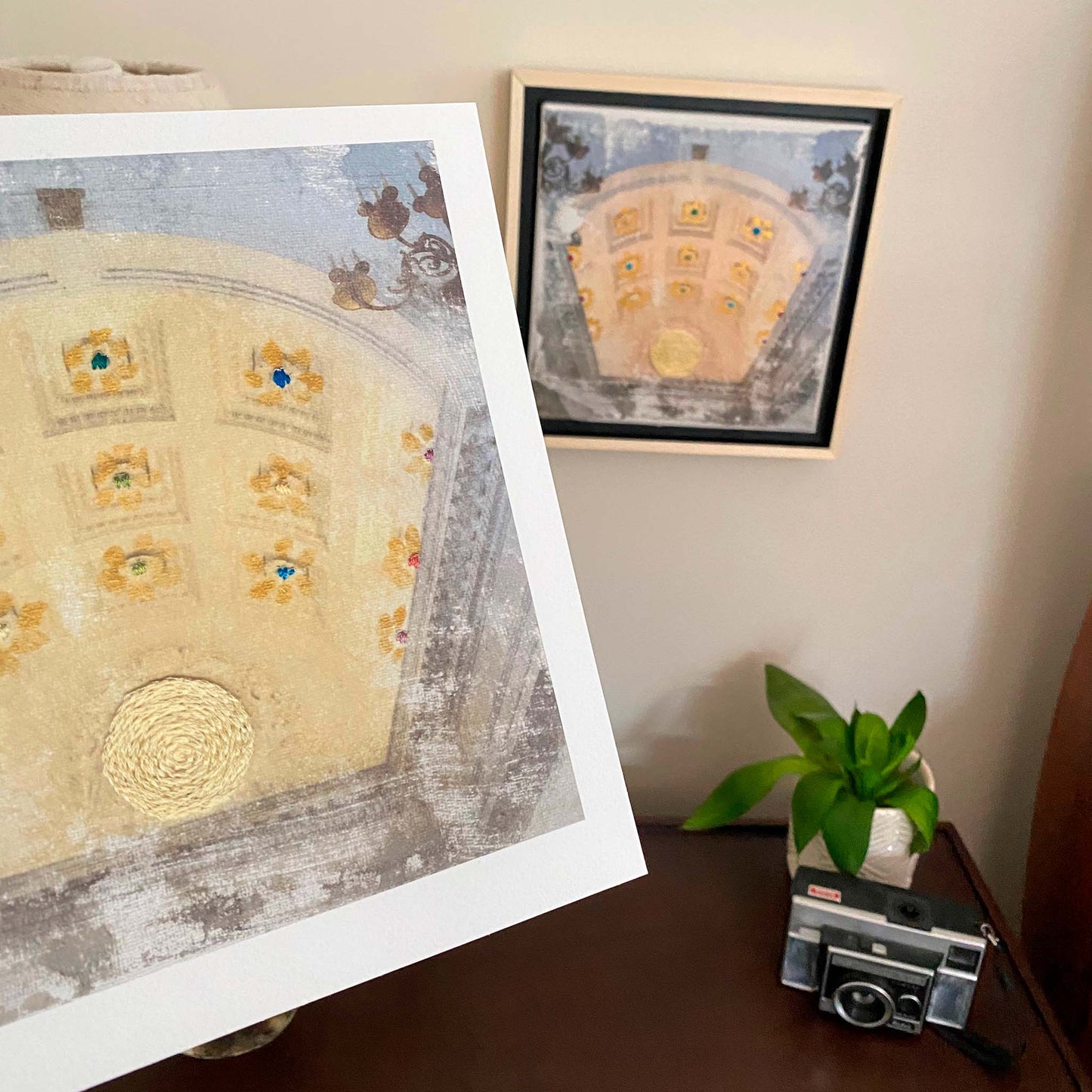 Art print of Canfield Casino portico with golden painted flower petals with colorful embroidered centers and golden yellow embroidered sun.